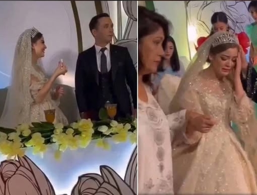 Bir düğün töreninde damadın geline yönelik